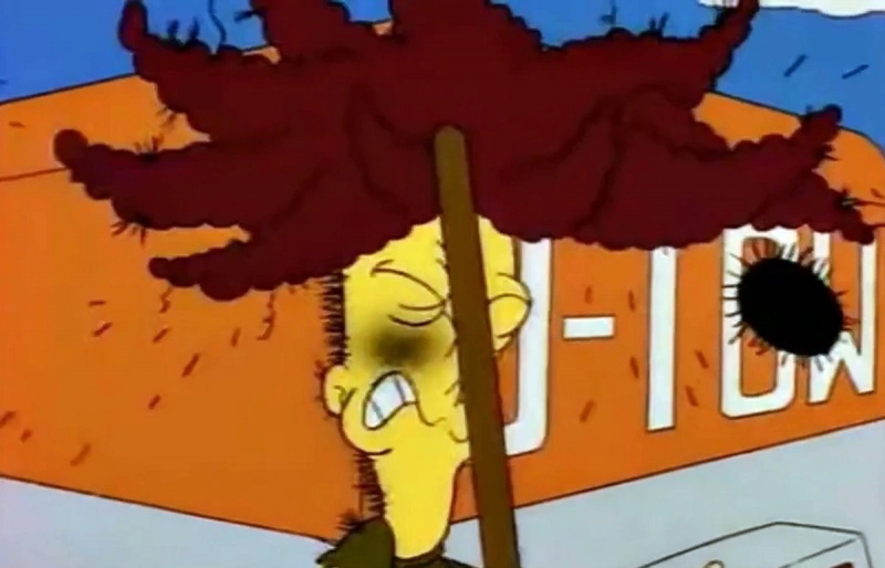   Bočná show Bob sa udiera hrabľami do tváre na Simpsonovcov.